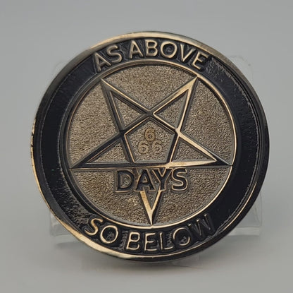  Brief video showing the light shimmering on the back face of a 666 day sobriety coin