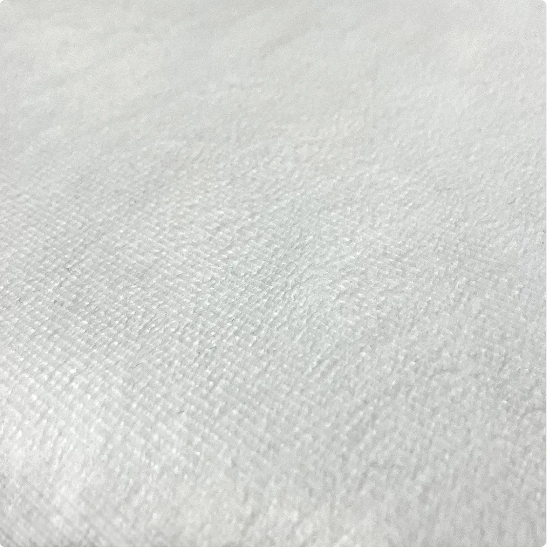 Image of sample fabric. Outer polyester fabric with soft brushed finish.