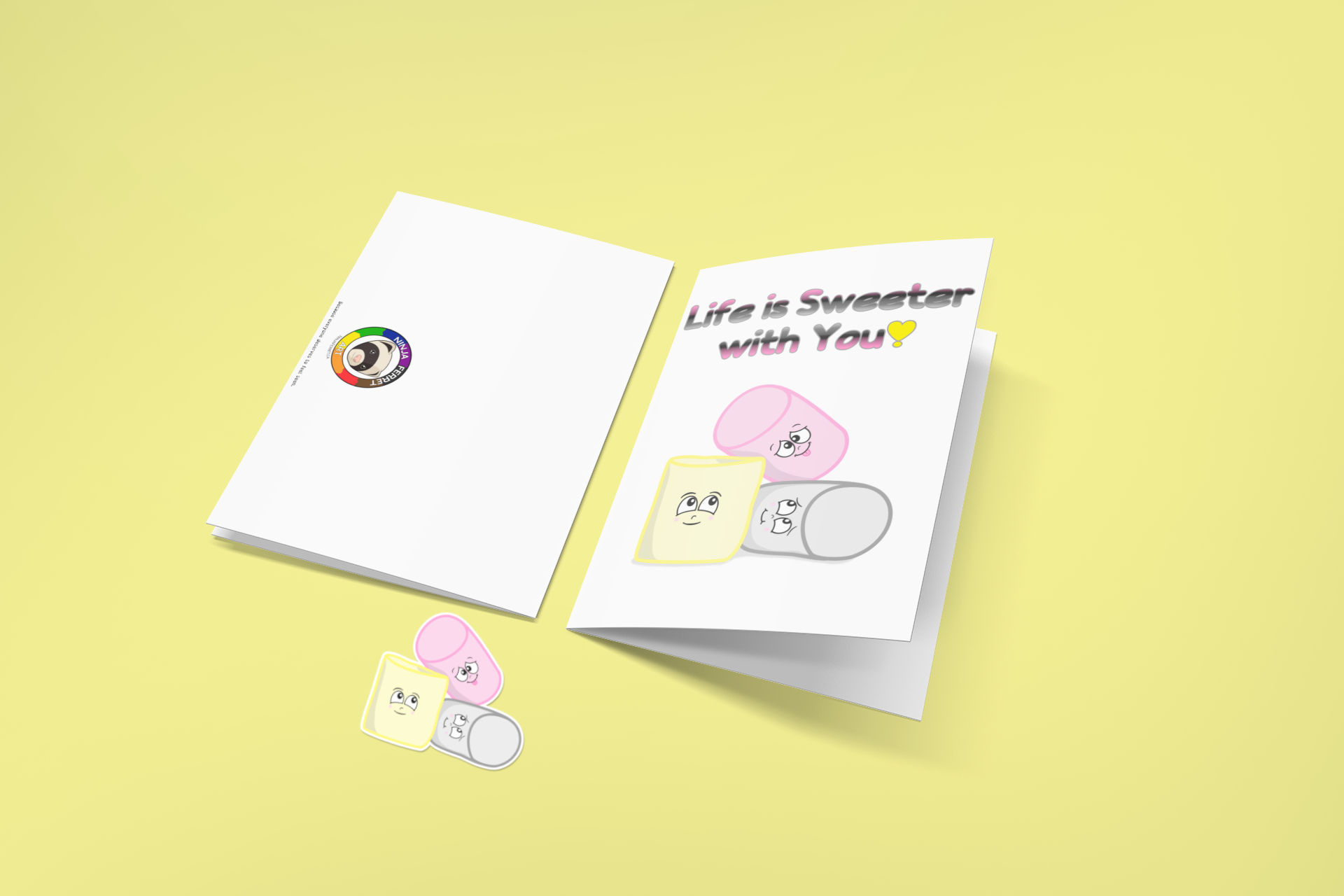 Two greeting cards on a yellow background. The first is flipped to show the back, with the Ninja Ferret Logo. The second has a white background. At the top is the text, "Life is Sweeter with You!" in the queerplatonic pride flag colours. Below are matching pink, yellow, and grey cartoon marshmallows with cute expressions. Below the cards is a matching sticker of three marshmallows.